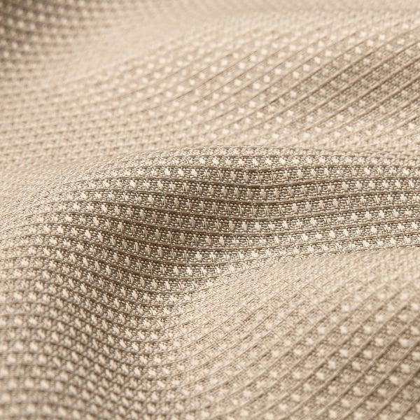 Close-up van getextureerde, waterafstotende polyesterstof, met het wafelpatroon.