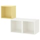 Twee kubusvormige opbergplanken. Een gele, een witte. Minimalistisch, boxy ontwerp. Monteerbare wandunit.