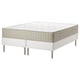 Een wit ESPEVÄR/VATNESTRÖM bed met een pocketvering matras. Modern design met roestvrijstalen poten.