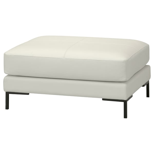 Moderne witte leren poef, vierkante vorm, zwarte metalen poten, minimalistisch design.