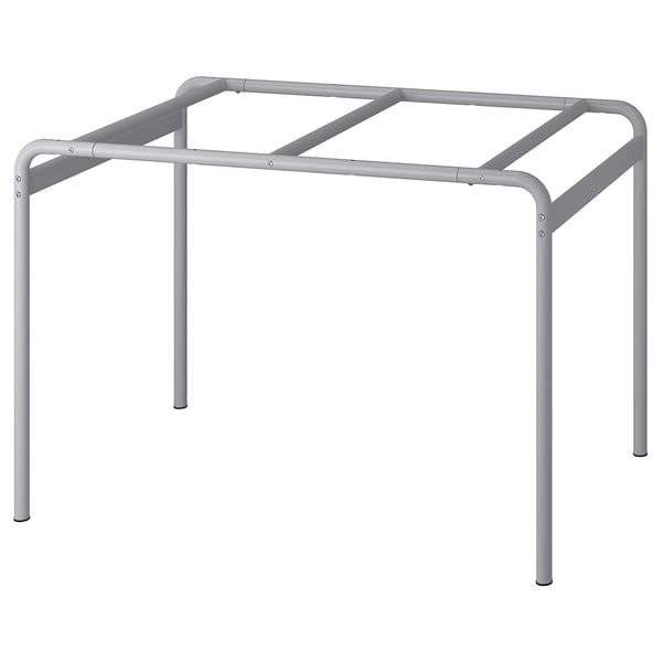 Een grijs metalen tafelframe genaamd GRÅSALA. Het is vierkant, modern en industrieel met steunpoten en spijlen.
