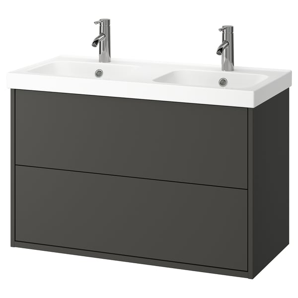 Donkergrijze dubbele wastafel met twee lades en dubbele witte wastafels.