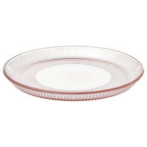 Deze afbeelding roze, ronde glasplaat met verticaal ontwerp, gemaakt van gehard glas, perfect voor het serveren van voedsel.