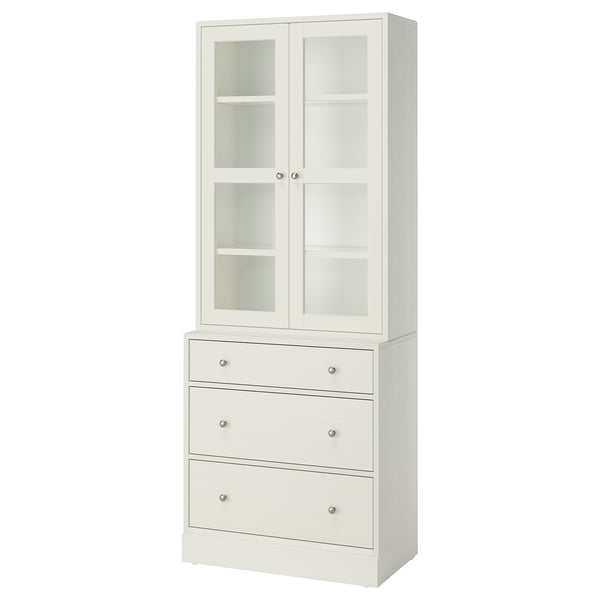 Witte HAVSTA set: glazen kast, grenen kist met metalen handgrepen.