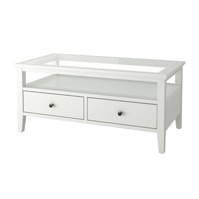 IDANÄS witte salontafel met glazen blad, twee lades, houten frame.