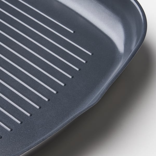 Zwarte grillpan met verhoogde ribbels, hoogwaardig antiaanbaklaag.