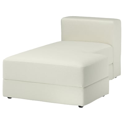 Een JÄTTEBO-bank in het wit, met een zachte, getextureerde boucléstof in een minimalistisch ontwerp, met strakke lijnen en een comfortabele, uitnodigende vorm.
