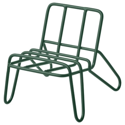 Deze afbeelding toont een KRUBBET telefoonhouder, groen, gemaakt van gepoedercoat staal, in een modern, minimalistisch design.