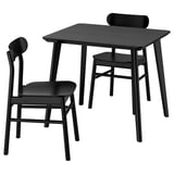 Een zwarte LISABO eethoek met een rechthoekige tafel en twee bijpassende stoelen. Het is modern, compact en gemaakt van hout.