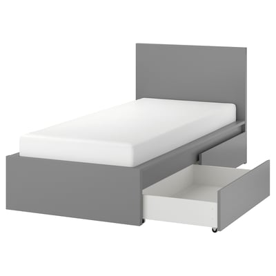 MALM grijs bed met witte matras, strak design, 2 lades voor opslag.