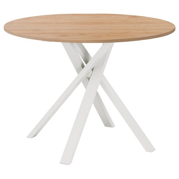 Moderne ronde eettafel met licht houten blad en wit gekruiste metalen poten. Elegant en stevig ontwerp.