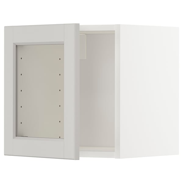 METOD wandkast, wit, rechthoekig, modern minimalistisch design met één open deur.