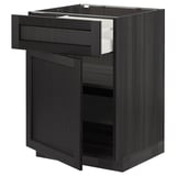 Moderne zwarte keukenkast met een open lade, een deur en houten afwerking.