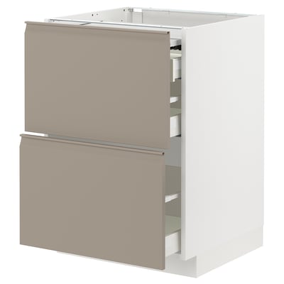 Modern keukenblok: METOD met beige lades, strakke handgrepen en geïntegreerde vakken.