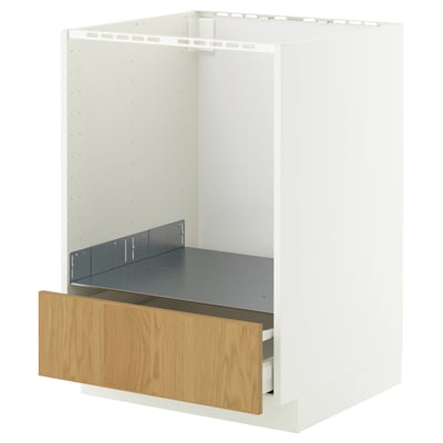 Witte IKEA METOD keukenkast met houten lade, minimalistisch design, enkele lade gedeeltelijk open.