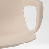 Ronde, beige rugleuning met gladde afwerking, met een stevig design en strakke lijnen.