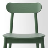 Moderne, groene houten stoel met gebogen rug en zitting. Stevig & comfortabel; Perfect om te dineren.