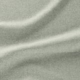 Close-up van milieuvriendelijke, gerecyclede polyesterstof, met ingewikkelde textuur en weefsel.