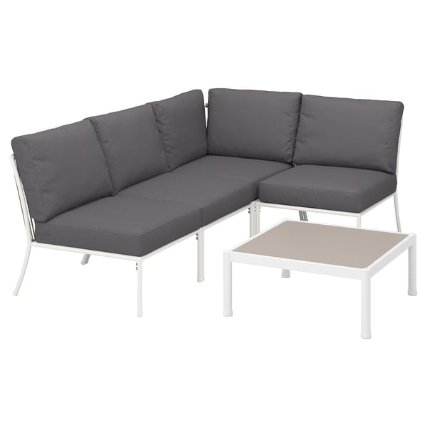 Moderne hoekbank voor buiten, donkergrijze kussens, wit metalen frame. Perfect voor patio.