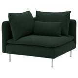 Donkergroene gestoffeerde fauteuil met metalen poten, bekleding van zachte chenillestof.