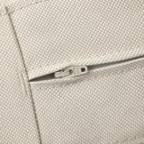 Close-up van hoogwaardig, beige geweven buitenkussen met heavy-duty ritssluiting