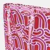 Opvouwbare tas met levendige abstracte print, met hoogwaardig gerecycled polyester materiaal, perfect voor winkelen en reizen.
