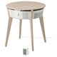 Ronde IKEA STARKVIND luchtreiniger op tafel met sensor