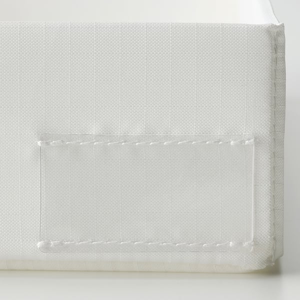 Witte stoffen hoes met doorzichtige plastic verdeler, netjes georganiseerd.