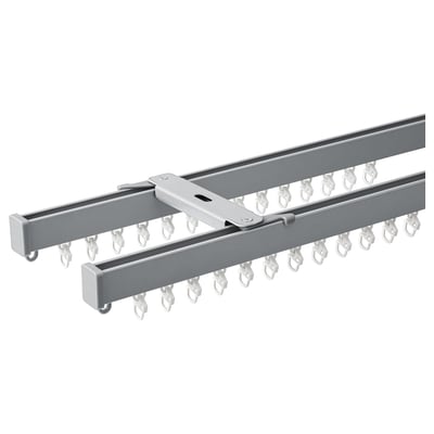 VIDGA grijs dubbelsporig gordijnrailsysteem voor plafondmontage met haken.