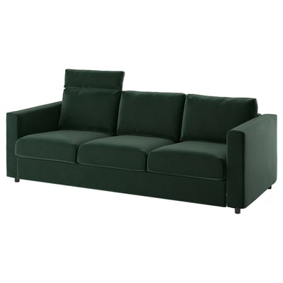 Een moderne groene VIMLE bank met drie zitplaatsen en een rugleuning. Het heeft een strak design en een comfortabele fluwelen hoes.