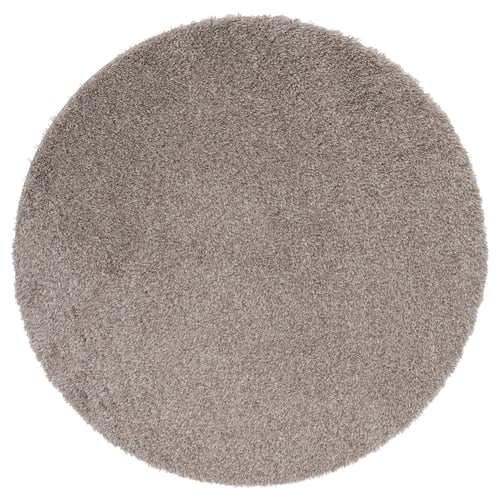 Zacht grijs ruig rond vloerkleed, gemaakt van gerecycled polyester. Zorgt voor een gezellig gevoel en vermindert geluid.