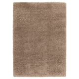 Een VOLLERSLEV ruig beige vloerkleed met verschillende garendiktes, met een zachte textuur en geluiddempende eigenschappen.