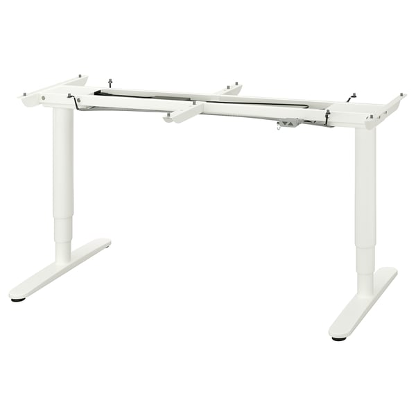 A BEKANT white height-adjustable desk.