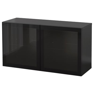 Black BESTÅ cabinet, rectangular, glossy finish, glass door, modern design.