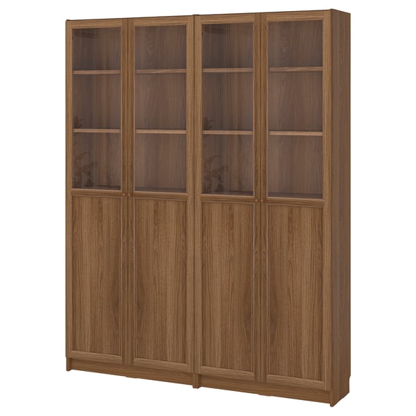 Large wooden bookshelf with six glass doors, showcasing multiple shelves.
