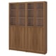 Large wooden bookshelf with six glass doors, showcasing multiple shelves.