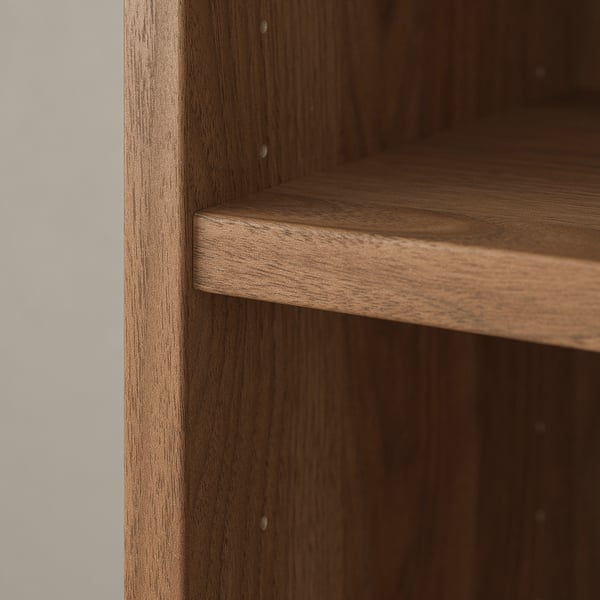 Dark wooden shelf close-up, revealing smooth grain and polished edges.