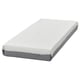 White and grey rectangular mattress by IKEA with reinforced edges.