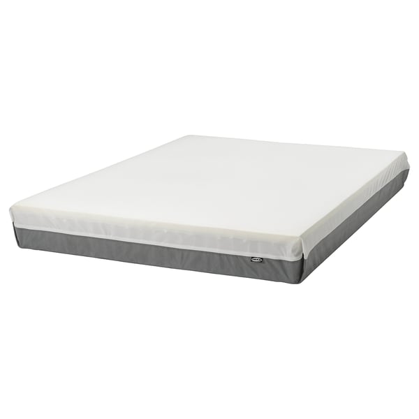 Flat white mattress with grey edges, made from recycled polyester and polyurethane foam, suitable for back support and breathability.