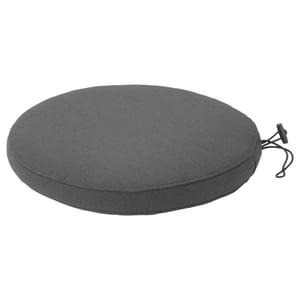Round grey cushion with tie, zip closure. Outdoor use, sustainable fabric.