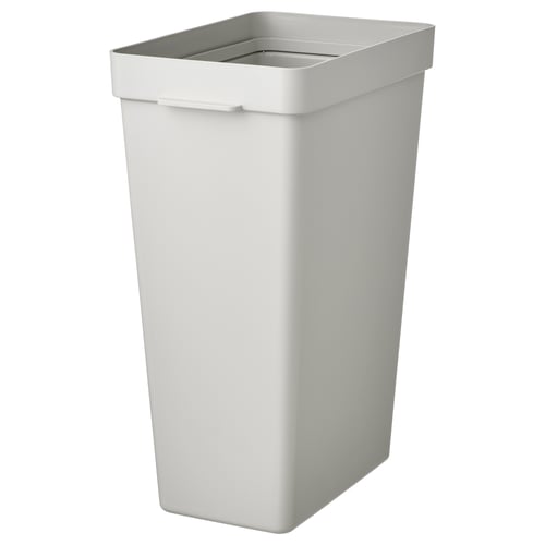 A white HÅLLBAR recycling bin. Its rectangular, made of recycled plastic, and has a handle for easy carrying.