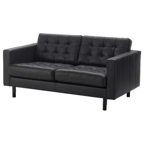 A black LANDSKRONA sofa with a tufted design and wooden legs.