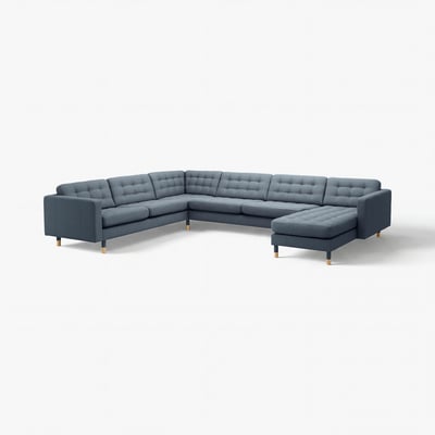 Modern l-shaped grey sofa with tufted back and seat cushions, wooden legs, and removable armrests.