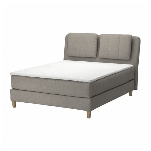 Modern grey upholstered bed with cushioned headboard, light wood legs.