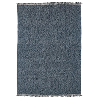 Dark blue rectangular cotton rug with herringbone pattern and fringed ends.