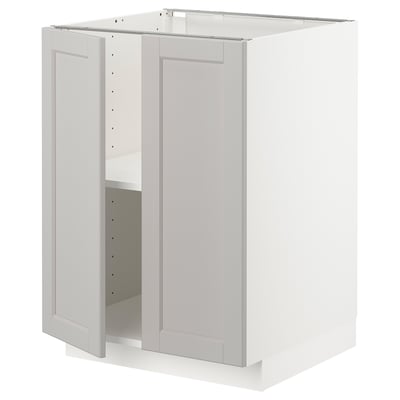 A white METOD base kitchen cabinet with an open door, featuring a light grey lerhyttan design with bevelled edges.