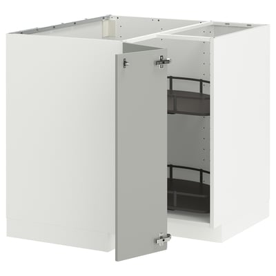 A white METOD kitchen cabinet set featuring a pull-out shelf. Its sleek, light grey, modern design includes a smooth finish and metallic handles.