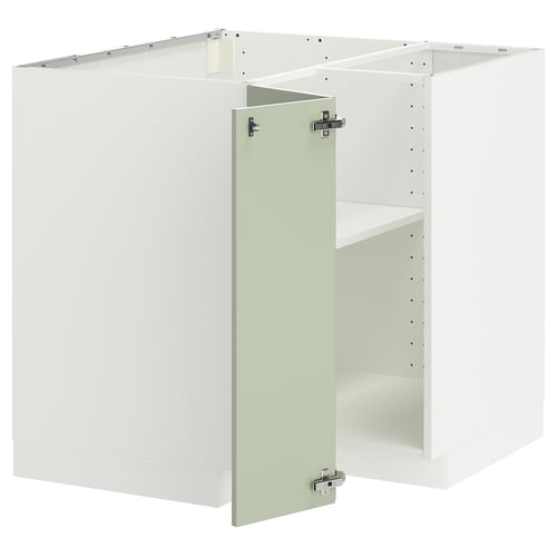 White METOD kitchen cabinet set with green door, hinged.