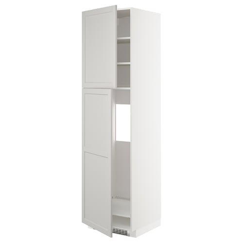 White METOD kitchen cabinet with bevelled edges, tall and rectangular with two open doors revealing shelves.
