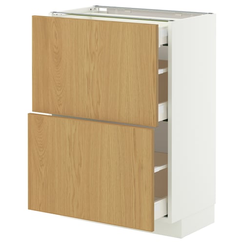 An open, white METOD kitchen cabinet with light wooden drawers and shelves.